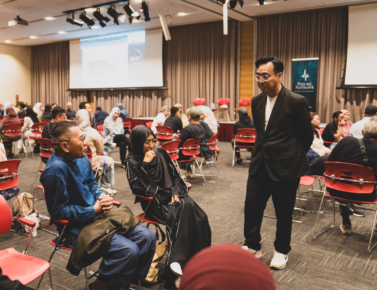 Mizi speaking with workshop participants